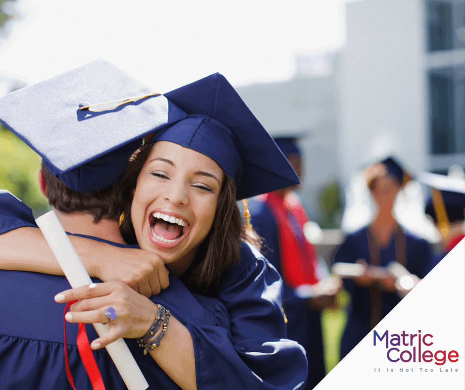 Two happy graduates in blue gowns celebrate with a hug, representing success in education while exploring the meaning of HG/SG in Matric results.