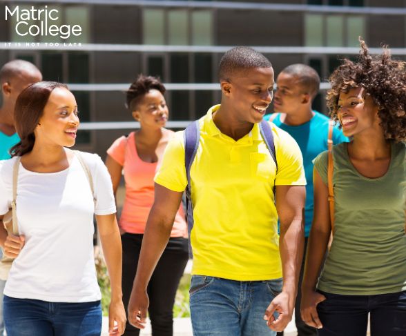 Young African students walking together, showing that age doesn't define success in Grade 12.